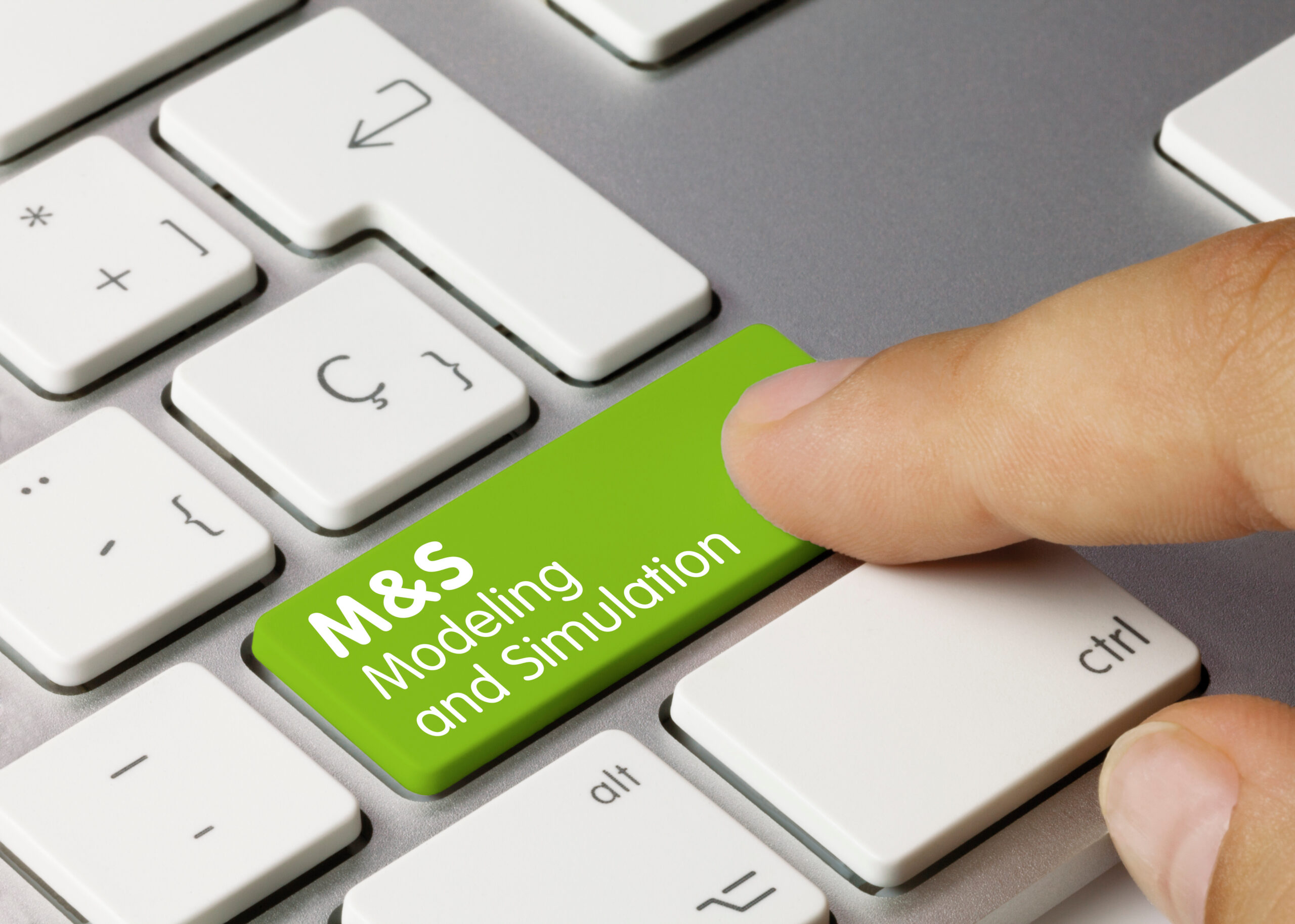 M&S modeling and simulation – Inscription on Green Keyboard Key.